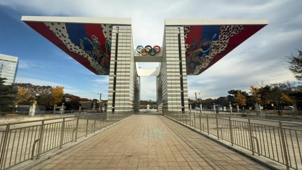 Seoul Olympic Park guide for foreigners — World Peace Gate with autumn foliage