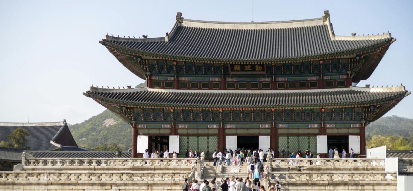Hanbok palace photo travel — Suwon Hwaseong fortress wall walking guide hero image