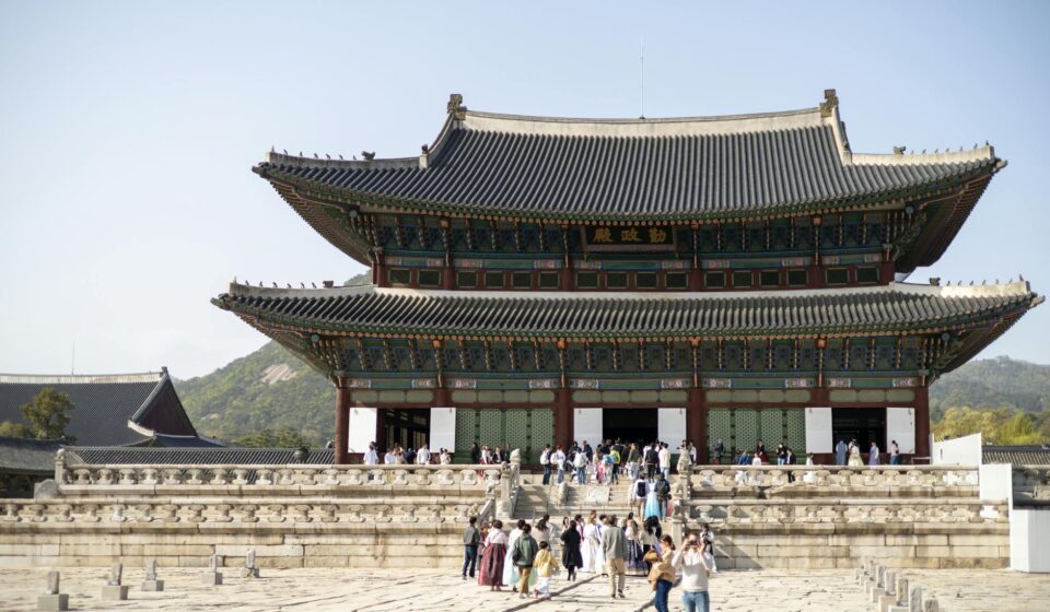 Hanbok palace photo travel — Suwon Hwaseong fortress wall walking guide hero image
