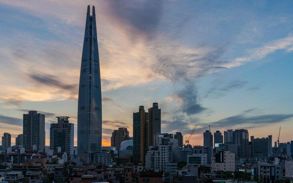 Jamsil family day trip course - Lotte World Tower Seoul skyline at twilight