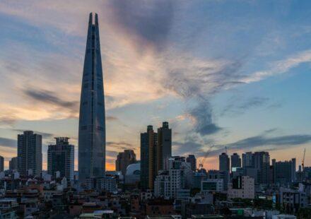 Jamsil family day trip course - Lotte World Tower Seoul skyline at twilight