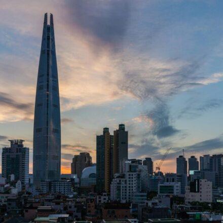 Jamsil family day trip course - Lotte World Tower Seoul skyline at twilight
