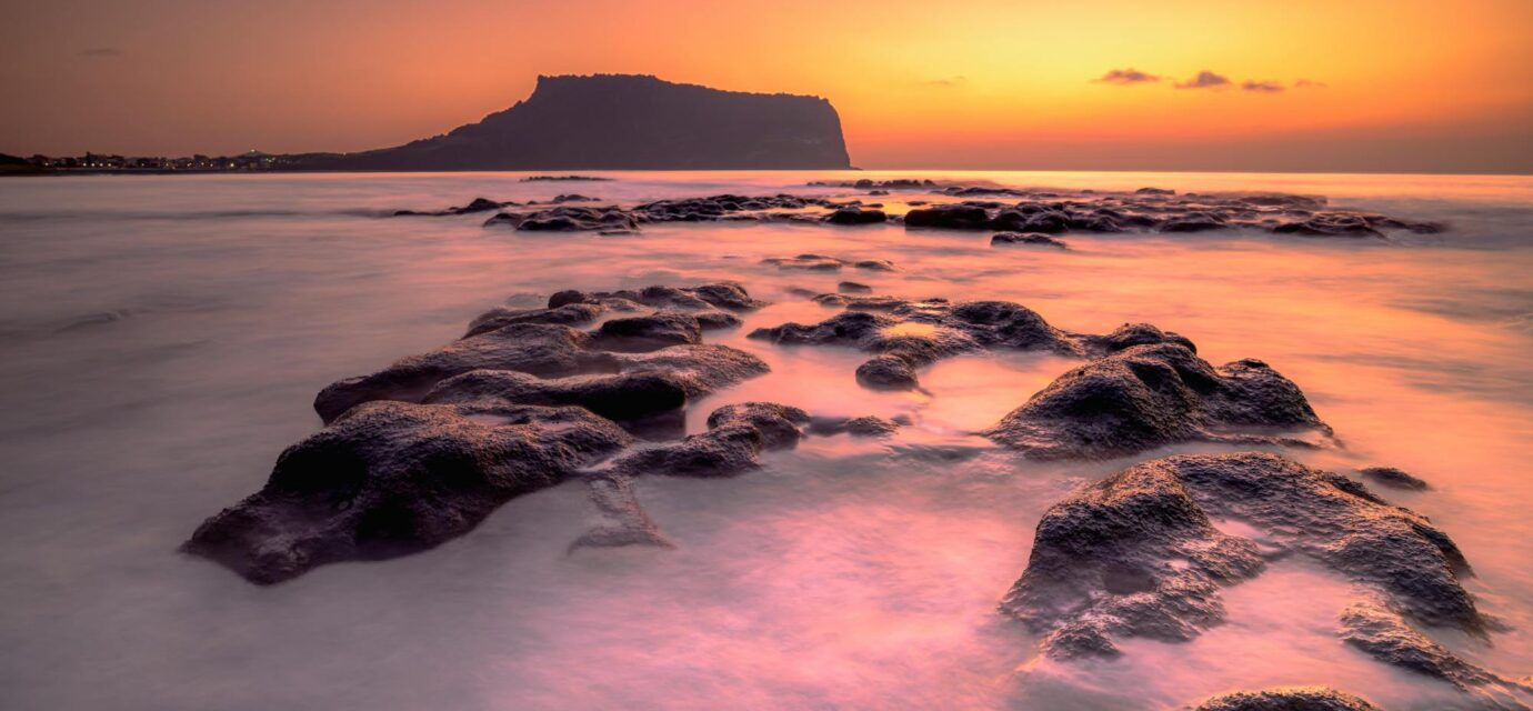 Jeju 3 nights 4 days itinerary — sunrise over Seongsan Ilchulbong on the east coast