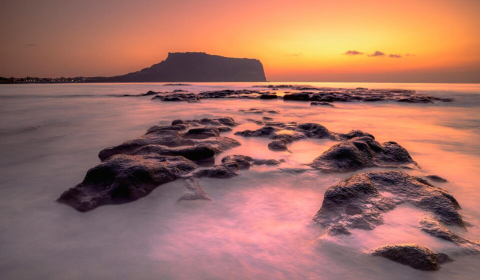 Jeju 3 nights 4 days itinerary — sunrise over Seongsan Ilchulbong on the east coast