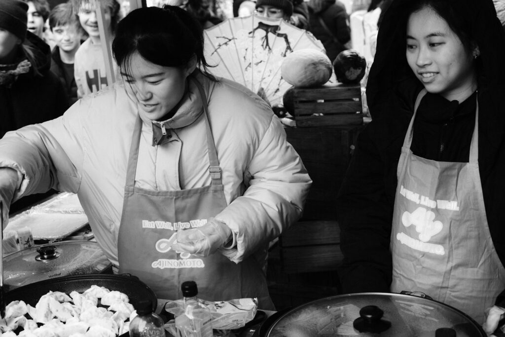 Korean cooking class — instructor and students