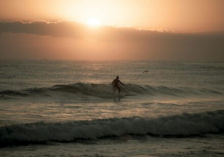Yangyang surfing sunset — surfer silhouette at a Yangyang beach (Pexels)