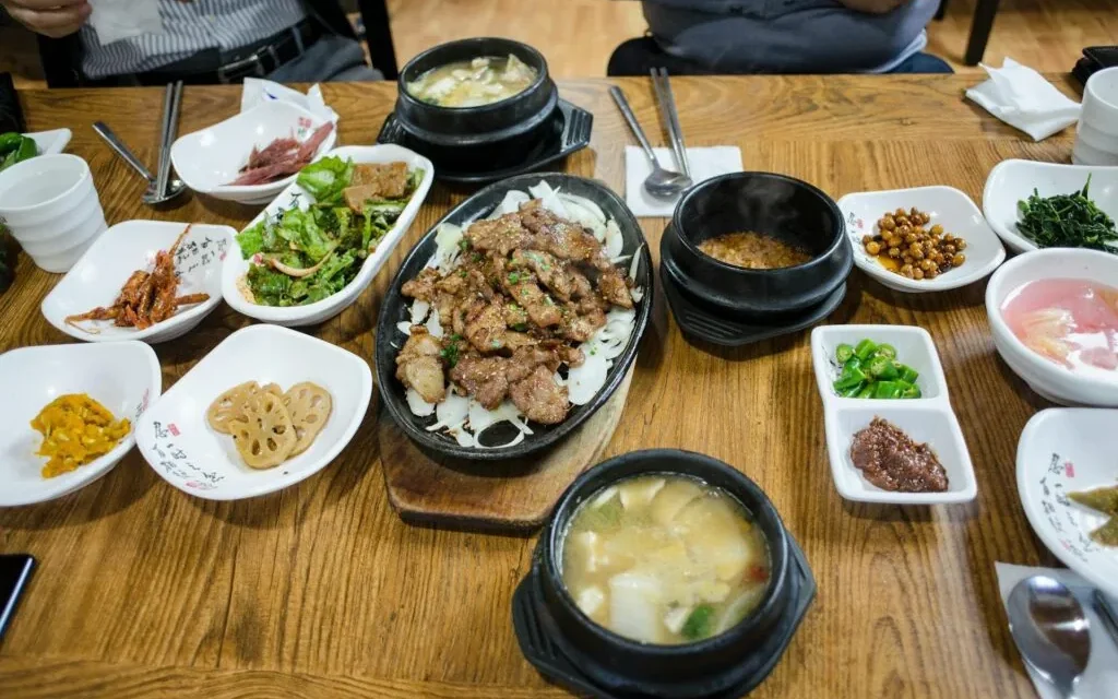 Korean food basics — a complete Korean home-style table spread with kimchi, banchan, and soup