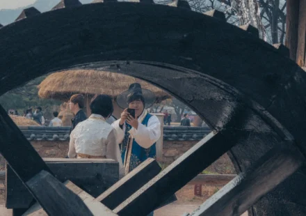Travelers wearing hanbok in a Korean traditional village